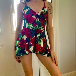 Womens romper size S no zip. Very stretchy. Christmas floral design